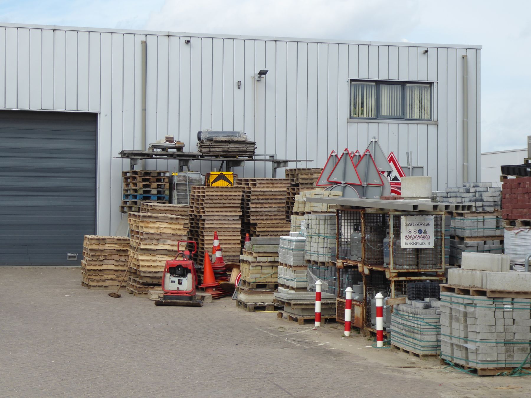 Building materials stored in a distribution yard and warehouse environment