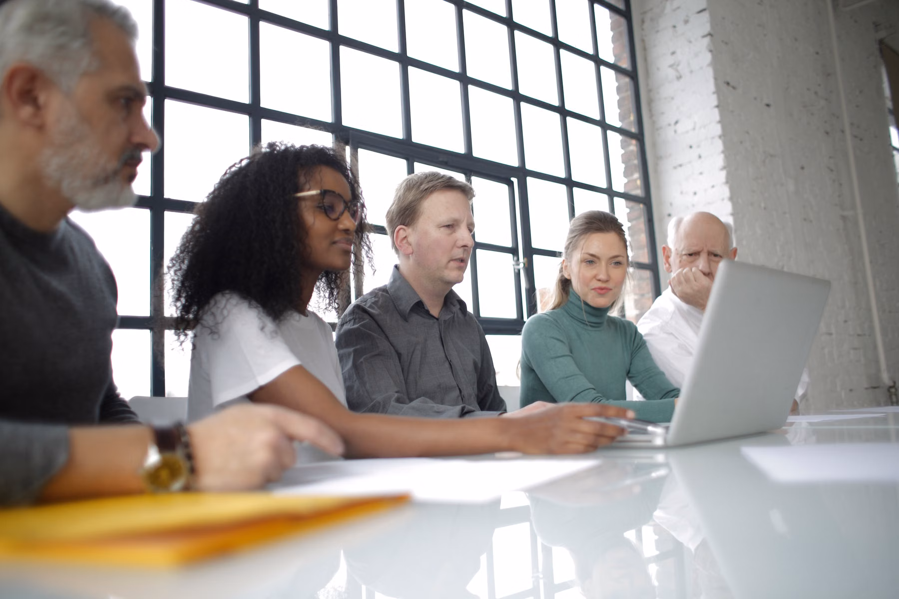 Business team reviewing a workflow before introducing automation