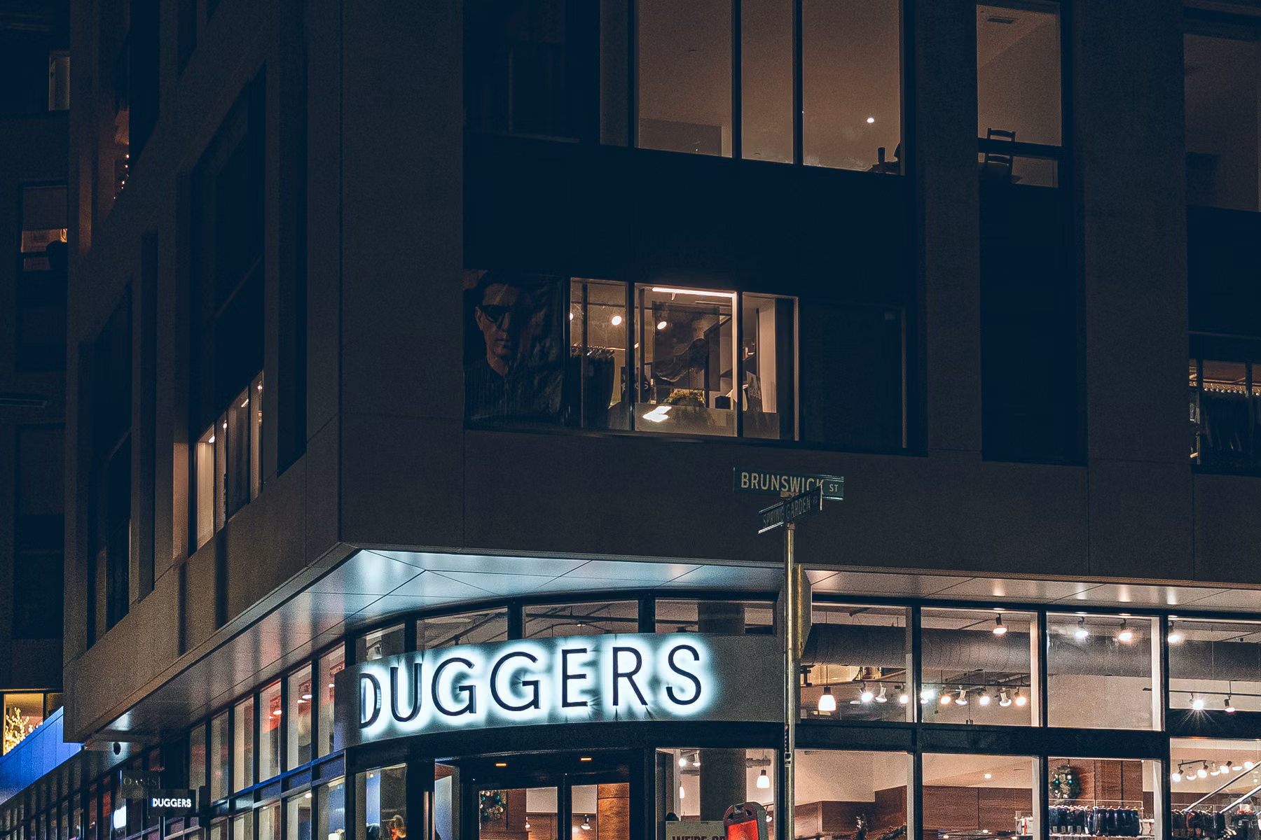 Modern storefront representing technology planning before opening another business location